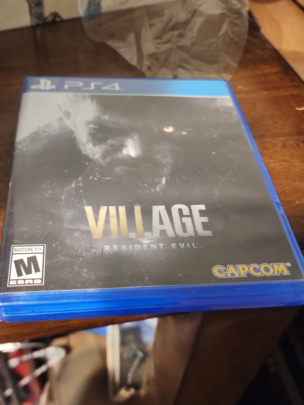 Capcom Village: Resident Evil (PS4) - Black/Blue Game Case